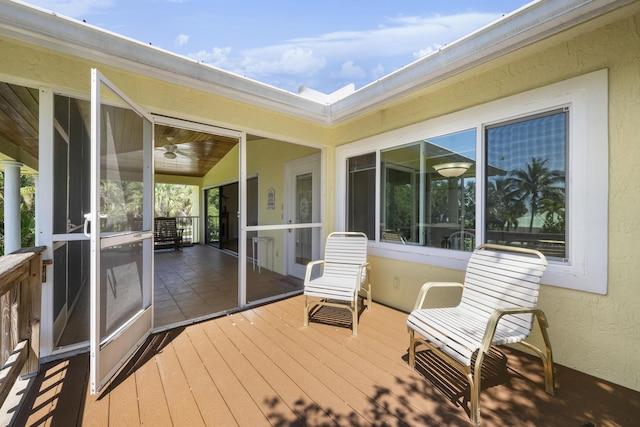 1530 NE Dixie Hwy, Jensen Beach, FL 34957 - wooden deck with a sunroom