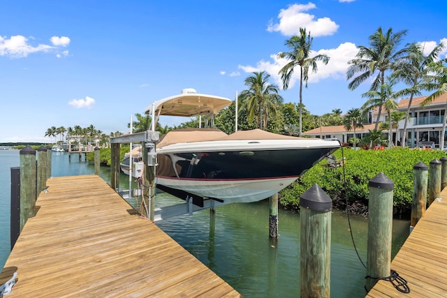 6460 SE Harbor Cir, Stuart, FL 34996 - dock area featuring boat lift and a water view