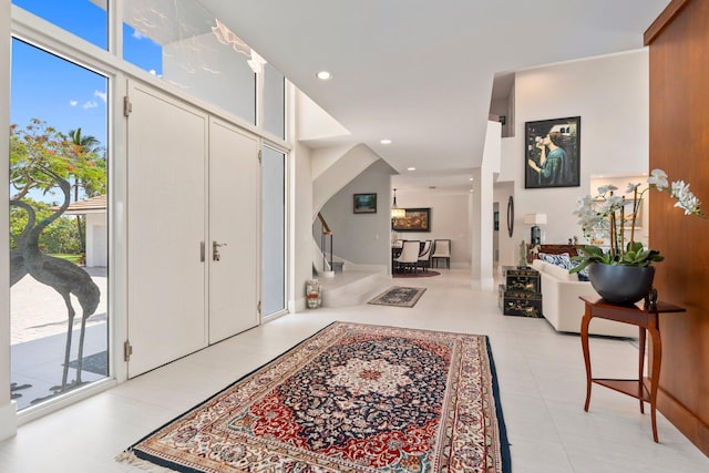 6460 SE Harbor Cir, Stuart, FL 34996 - foyer with light tile patterned floors
