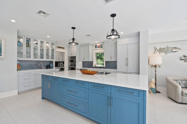 6460 SE Harbor Cir, Stuart, FL 34996 - kitchen featuring decorative backsplash, stainless steel double oven, baseboards, and recessed lighting