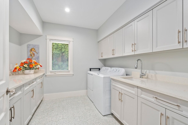6460 SE Harbor Cir, Stuart, FL 34996 - laundry room featuring washing machine and clothes dryer, cabinet space, baseboards, and recessed lighting