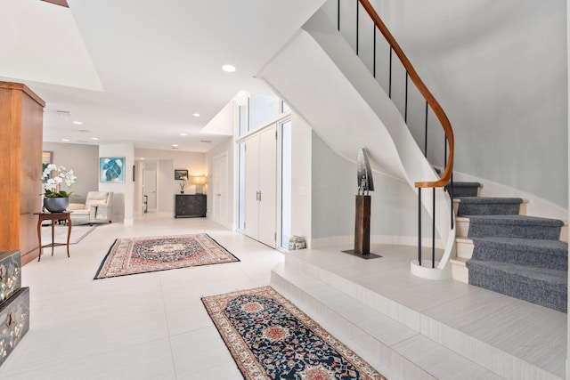 6460 SE Harbor Cir, Stuart, FL 34996 - tiled entryway with stairs and recessed lighting