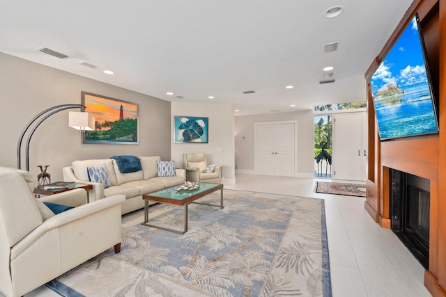 6460 SE Harbor Cir, Stuart, FL 34996 - living area featuring recessed lighting, a fireplace, and baseboards