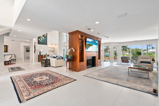 6460 SE Harbor Cir, Stuart, FL 34996 - living room with a fireplace and recessed lighting