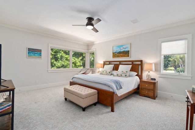 6460 SE Harbor Cir, Stuart, FL 34996 - bedroom featuring ornamental molding, baseboards, carpet, and a ceiling fan