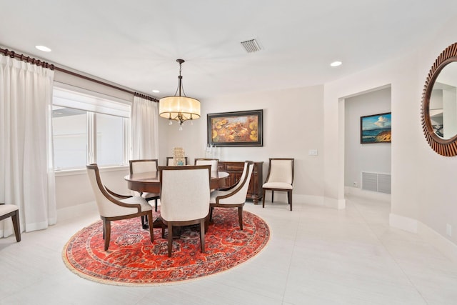 6460 SE Harbor Cir, Stuart, FL 34996 - dining space featuring a chandelier, recessed lighting, baseboards, and light tile patterned flooring