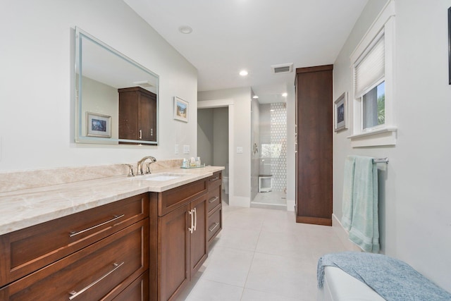 6460 SE Harbor Cir, Stuart, FL 34996 - full bath with vanity, a stall shower, baseboards, and tile patterned floors