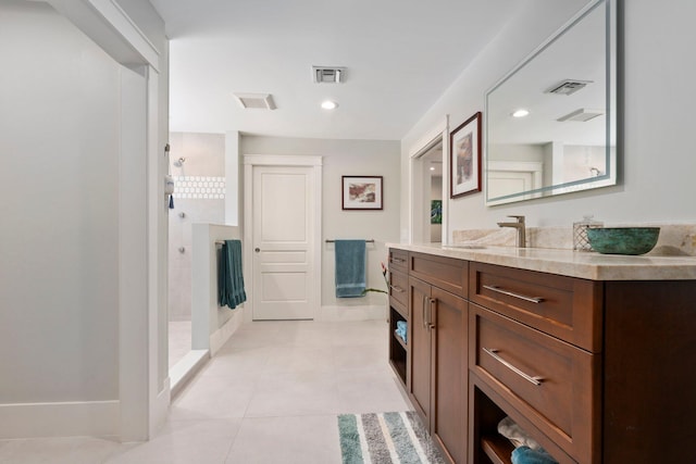 6460 SE Harbor Cir, Stuart, FL 34996 - full bath with vanity, tiled shower, tile patterned flooring, baseboards, and recessed lighting