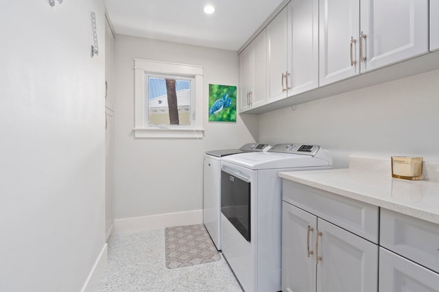 6460 SE Harbor Cir, Stuart, FL 34996 - washroom with separate washer and dryer, baseboards, cabinet space, and recessed lighting