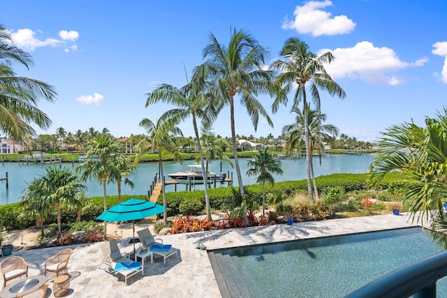 6460 SE Harbor Cir, Stuart, FL 34996 - view of pool featuring a water view and a patio