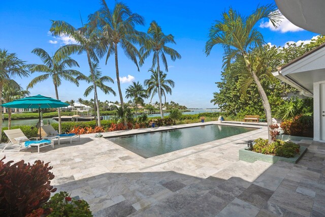 6460 SE Harbor Cir, Stuart, FL 34996 - outdoor pool with a patio