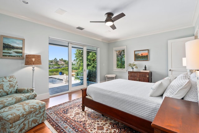 6460 SE Harbor Cir, Stuart, FL 34996 - bedroom featuring access to outside, crown molding, wood finished floors, ceiling fan, and baseboards
