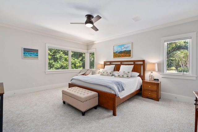 6460 SE Harbor Cir, Stuart, FL 34996 - carpeted bedroom with multiple windows, ornamental molding, baseboards, and ceiling fan