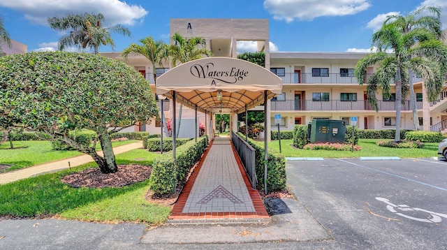 15075 Witney Rd Unit 108, Delray Beach, FL 33484 - view of building exterior with uncovered parking