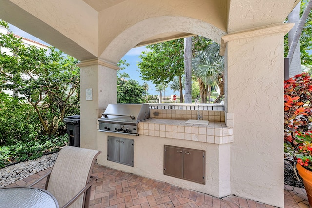 3628 S Ocean Blvd, Highland Beach, FL 33487 - view of patio / terrace with a sink