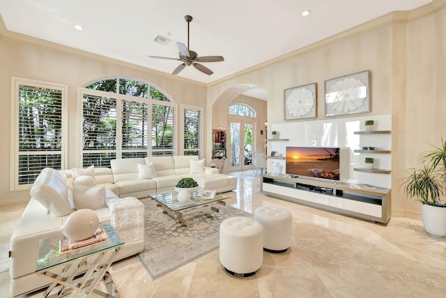 3628 S Ocean Blvd, Highland Beach, FL 33487 - living area featuring ornamental molding, arched walkways, a ceiling fan, recessed lighting, and marble finish flooring