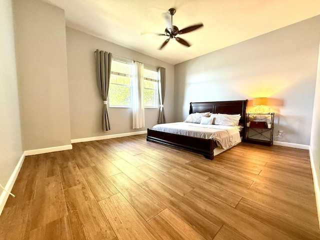 855 Marina Del Ray Ln Unit 2, West Palm Beach, FL 33401 - bedroom with wood finished floors, baseboards, and ceiling fan