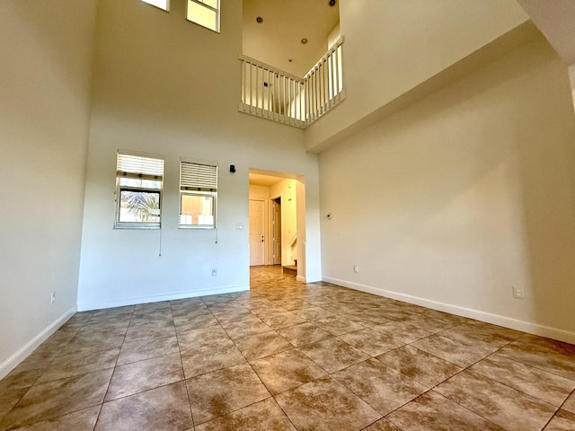 855 Marina Del Ray Ln Unit 2, West Palm Beach, FL 33401 - empty room with a towering ceiling and baseboards