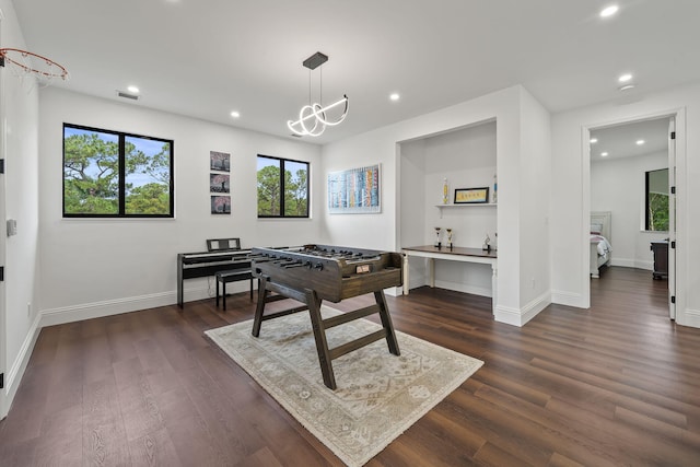 7887 150th Ct N, Palm Beach Gardens, FL 33418 - rec room featuring dark wood-type flooring, recessed lighting, baseboards, a chandelier, and a desk