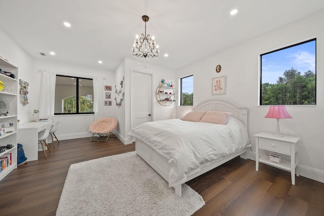 7887 150th Ct N, Palm Beach Gardens, FL 33418 - bedroom featuring dark wood-style flooring, a chandelier, recessed lighting, and baseboards