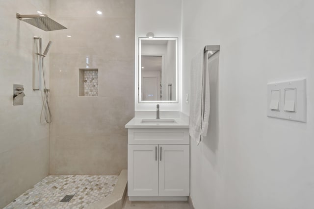 7887 150th Ct N, Palm Beach Gardens, FL 33418 - full bathroom featuring vanity and a tile shower