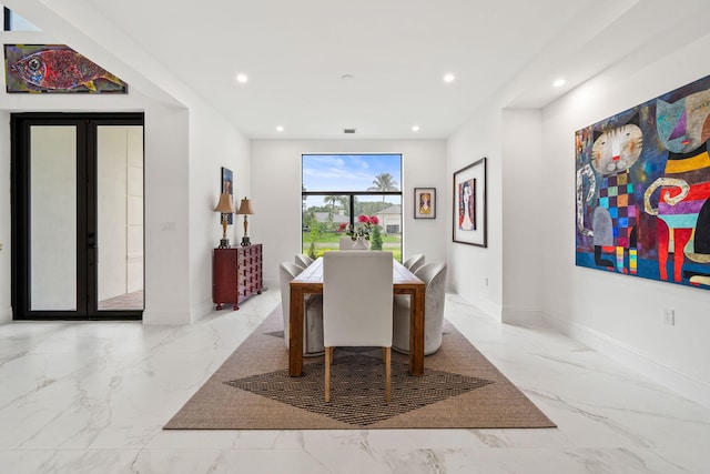 7887 150th Ct N, Palm Beach Gardens, FL 33418 - dining room with recessed lighting, marble tiled flooring, and baseboards