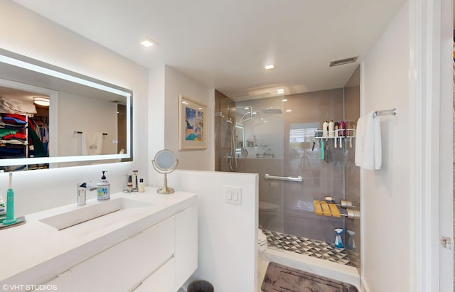 1340 S Ocean Blvd Unit 308, Pompano Beach, FL 33062 - full bath with vanity, a stall shower, toilet, and a spacious closet