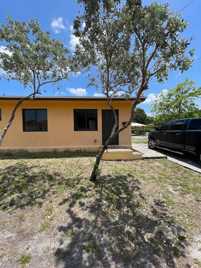 519 NW 3rd Ave Unit 519-521, Hallandale Beach, FL 33009 - view of front of house featuring stucco siding