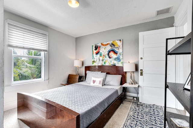 230 Princeton Dr, Lake Worth Beach, FL 33460 - bedroom with speckle patterned floor and baseboards