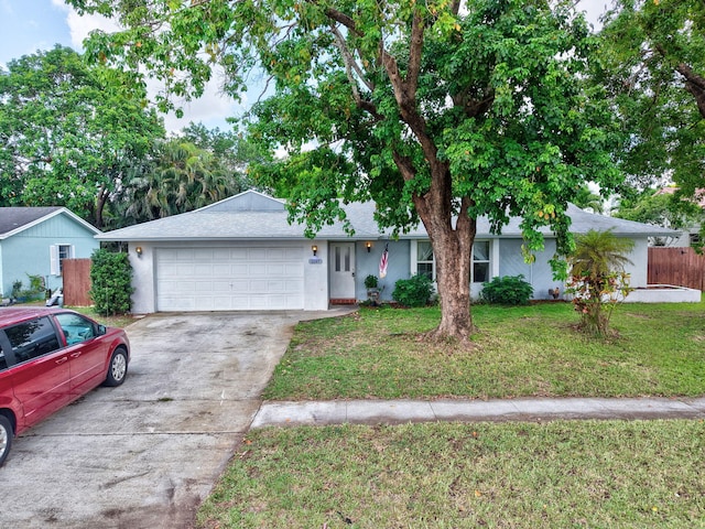 1197 Belmore Ter, Wellington, FL 33414 - single story home with an attached garage, concrete driveway, and stucco siding