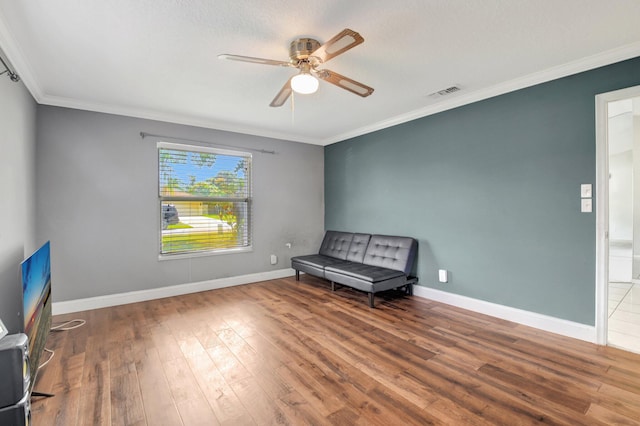 1197 Belmore Ter, Wellington, FL 33414 - unfurnished room with ceiling fan, wood finished floors, ornamental molding, and baseboards