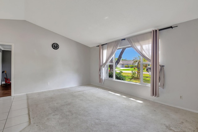 1197 Belmore Ter, Wellington, FL 33414 - empty room featuring lofted ceiling, carpet flooring, and baseboards