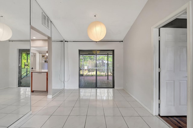 1197 Belmore Ter, Wellington, FL 33414 - spare room featuring light tile patterned floors and baseboards