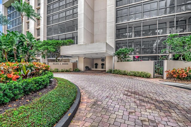 20100 Boca W Dr Unit 163, Boca Raton, FL 33434 - view of home's community featuring driveway