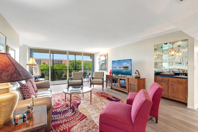 20100 Boca W Dr Unit 163, Boca Raton, FL 33434 - living area with light wood-style floors