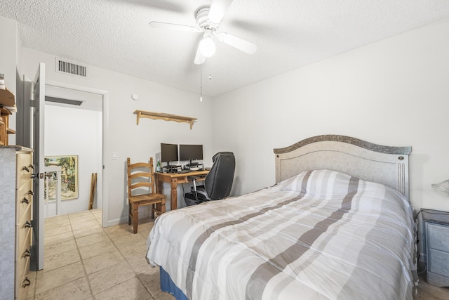 2513 25th Ln, Palm Beach Gardens, FL 33418 - bedroom with a textured ceiling and a ceiling fan
