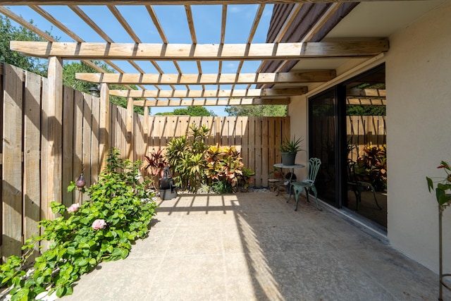 2513 25th Ln, Palm Beach Gardens, FL 33418 - fenced backyard featuring a pergola and a patio