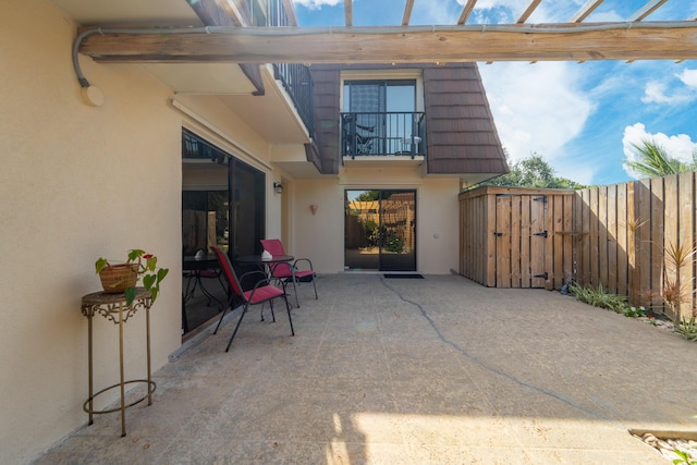 2513 25th Ln, Palm Beach Gardens, FL 33418 - view of patio / terrace with a balcony and a pergola