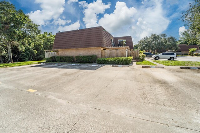 2513 25th Ln, Palm Beach Gardens, FL 33418 - view of uncovered parking lot