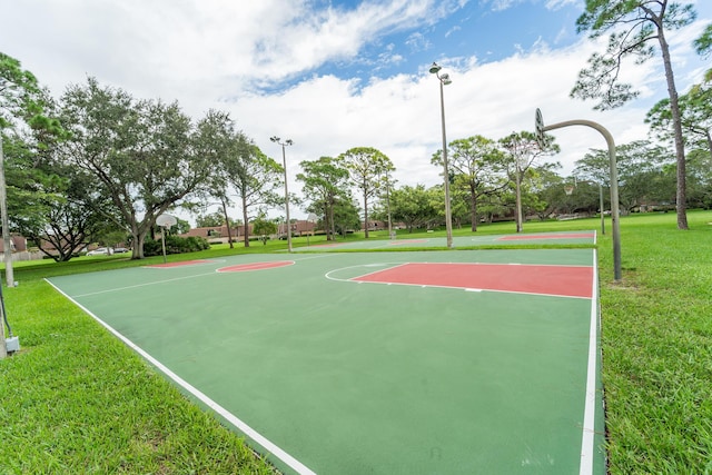 2513 25th Ln, Palm Beach Gardens, FL 33418 - view of basketball court featuring community basketball court and a yard