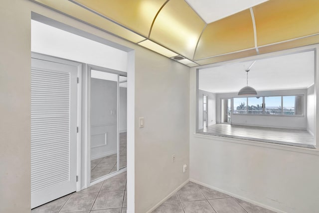 328 N Ocean Blvd Unit 404, Pompano Beach, FL 33062 - unfurnished dining area with tile patterned flooring and baseboards
