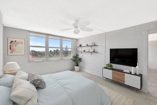 328 N Ocean Blvd Unit 404, Pompano Beach, FL 33062 - bedroom featuring wood finished floors, ceiling fan, and baseboards