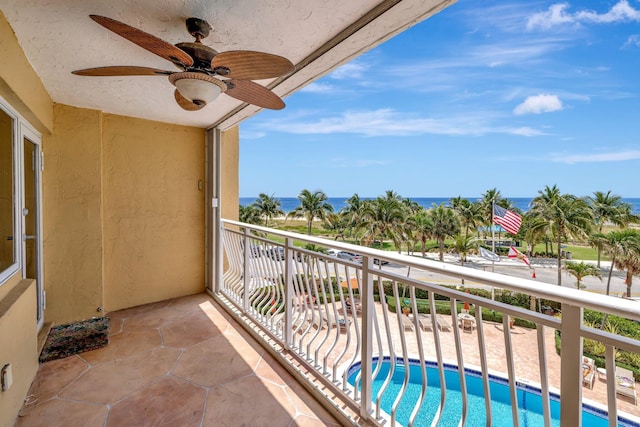 328 N Ocean Blvd Unit 404, Pompano Beach, FL 33062 - balcony featuring ceiling fan, a water view, and view of pool