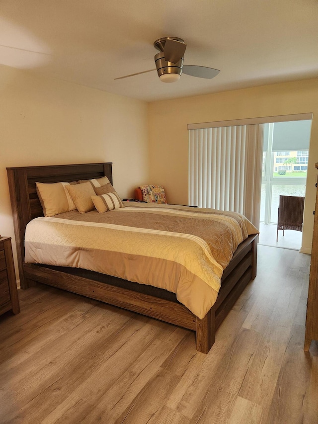 302 Wellington Unit B, West Palm Beach, FL 33417 - bedroom with wood finished floors and a ceiling fan