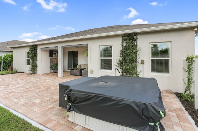 3974 SW Jarmer Rd, Port Saint Lucie, FL 34953 - view of patio / terrace featuring grilling area and a jacuzzi