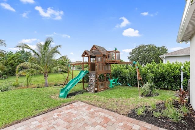 3974 SW Jarmer Rd, Port Saint Lucie, FL 34953 - view of play area with a yard