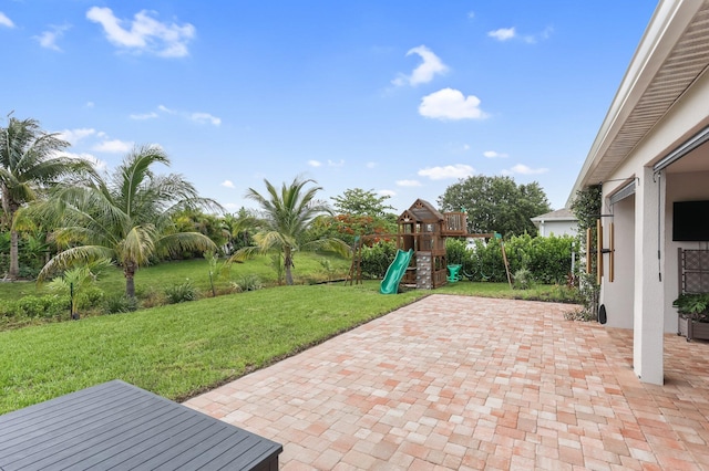 3974 SW Jarmer Rd, Port Saint Lucie, FL 34953 - view of patio / terrace with a playground