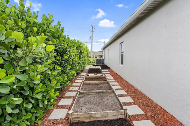 3974 SW Jarmer Rd, Port Saint Lucie, FL 34953 - view of yard with central AC