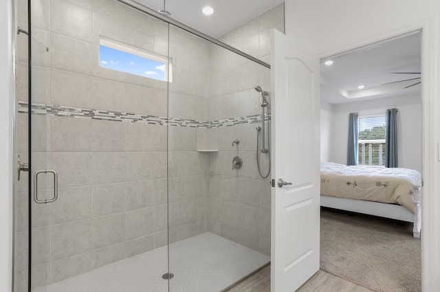 3974 SW Jarmer Rd, Port Saint Lucie, FL 34953 - ensuite bathroom with a shower stall, recessed lighting, and wood finished floors