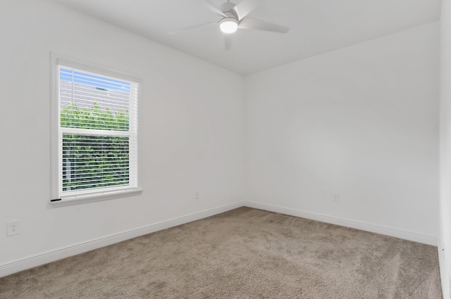 3974 SW Jarmer Rd, Port Saint Lucie, FL 34953 - carpeted empty room featuring baseboards and a ceiling fan
